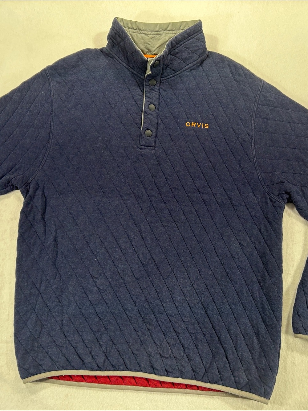 Orvis Quilted Navy Snap-Front Pullover with Orange Logo